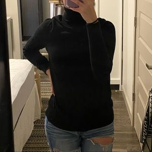 Black turtleneck sweater